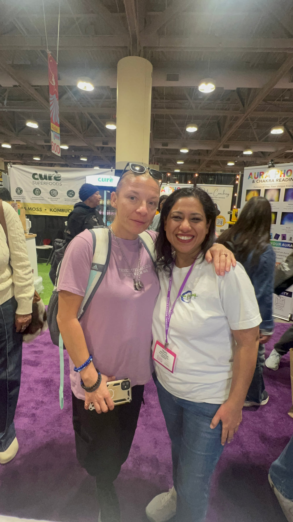 Trupti Sedani Pandhi meeting an attendee at a Blue Pepper trade show booth