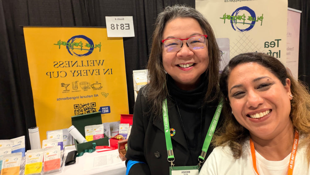 Trupti Sedani Pandhi welcoming a visitor to the Blue Pepper event booth